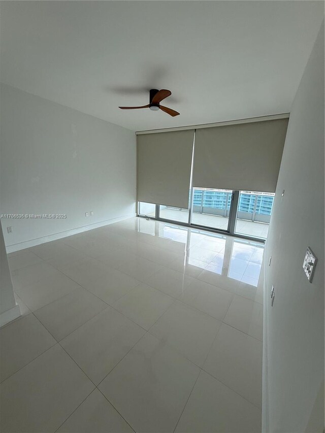 200 Biscayne Boulevard Way Unit 4904, Miami, FL 33131 - tiled spare room with a ceiling fan