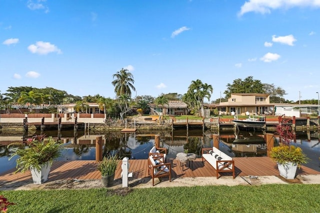 dock area with a water view