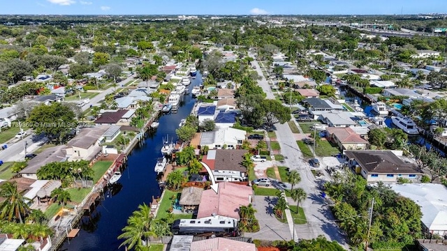 aerial view featuring a water view and a residential view