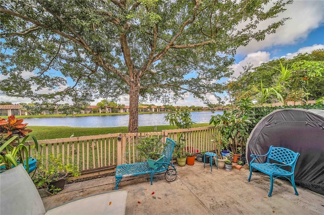 view of patio / terrace with a water view