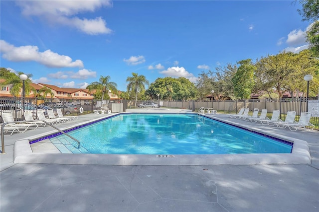 view of pool featuring a patio