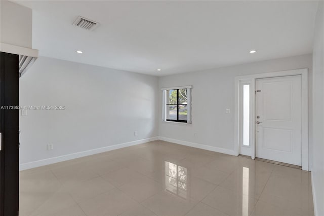 entrance foyer with light tile patterned flooring