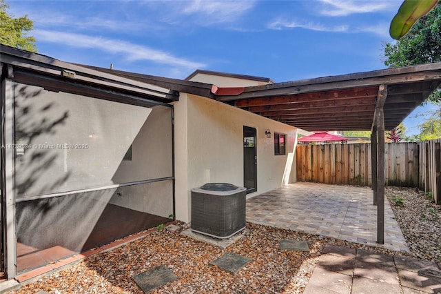 view of patio with central AC unit