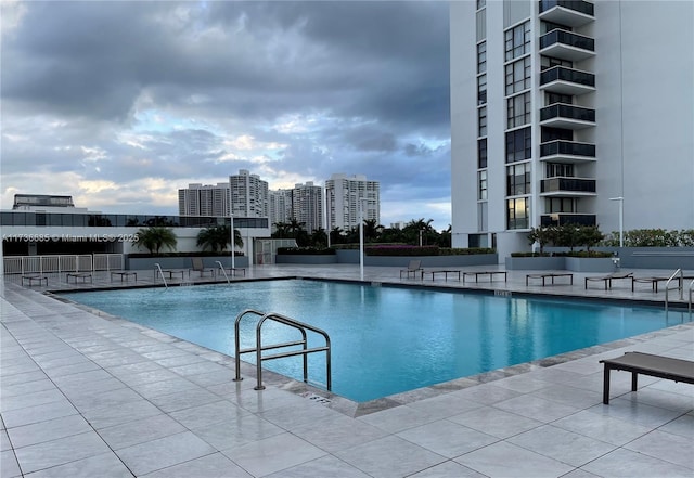 view of pool featuring a patio