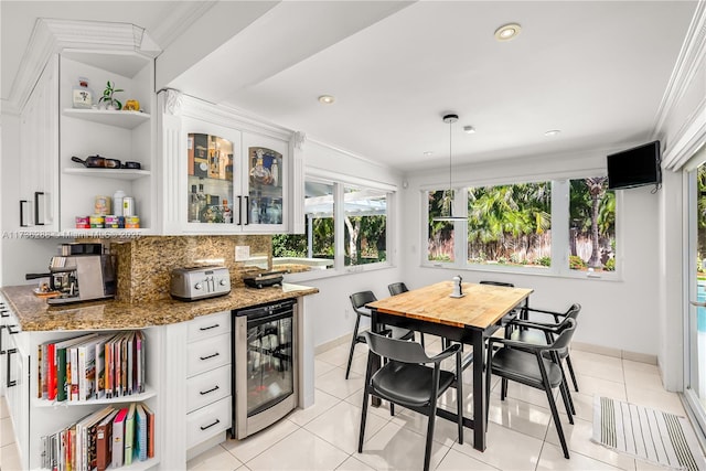 kitchen with wine cooler, white cabinetry, open shelves, and light tile patterned flooring