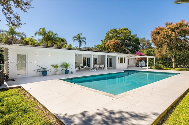 pool featuring a patio area