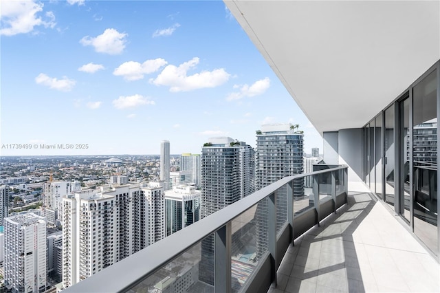 balcony featuring a view of city