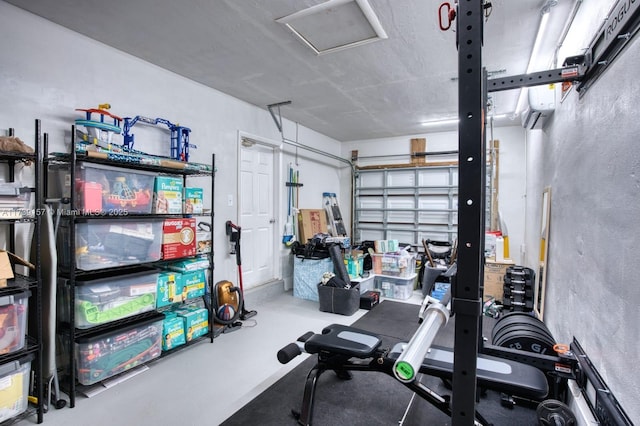 exercise room with a garage