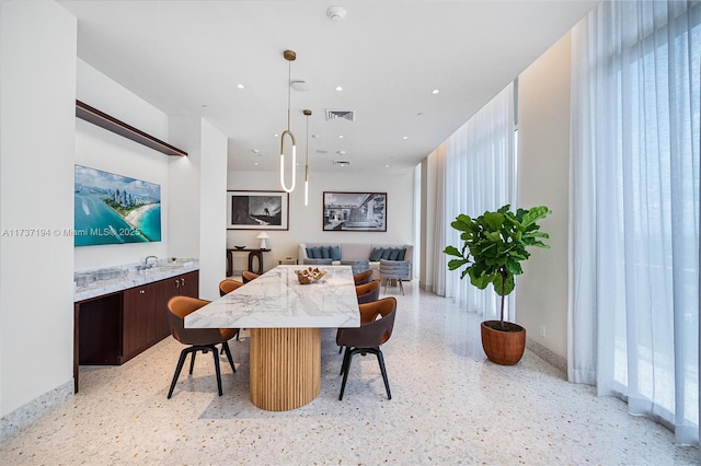 dining space with sink