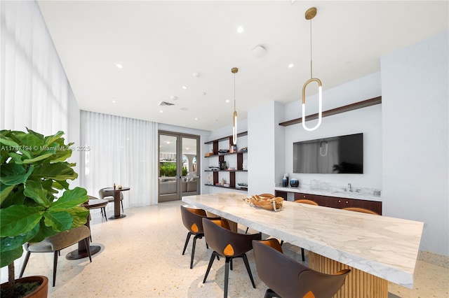 dining area featuring french doors