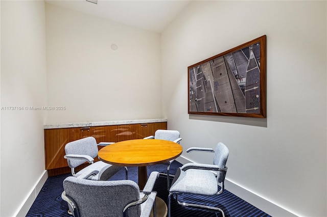 view of carpeted dining space