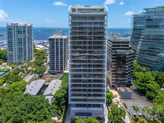 view of building exterior with a water view