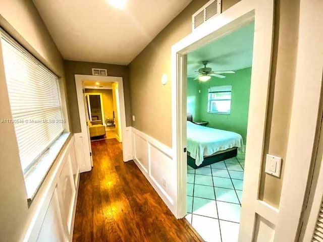 hallway featuring dark hardwood / wood-style flooring