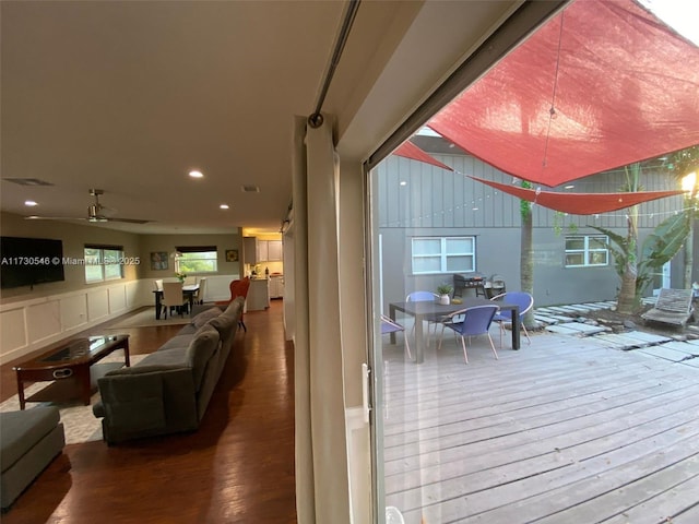 interior space featuring hardwood / wood-style flooring and ceiling fan