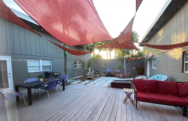 wooden deck with an outdoor hangout area