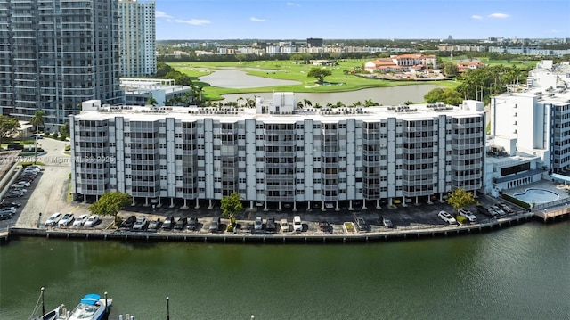 bird's eye view featuring a water view and a city view