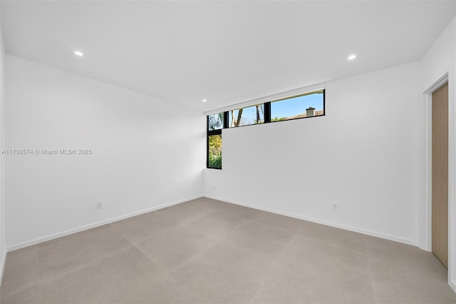 view of carpeted spare room