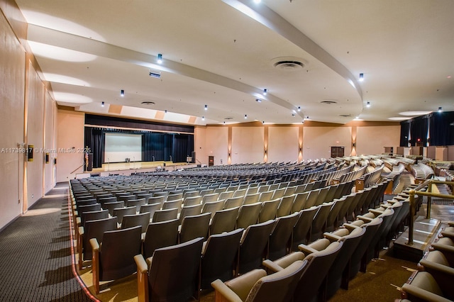 home theater featuring carpet