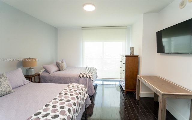 bedroom featuring dark hardwood / wood-style floors