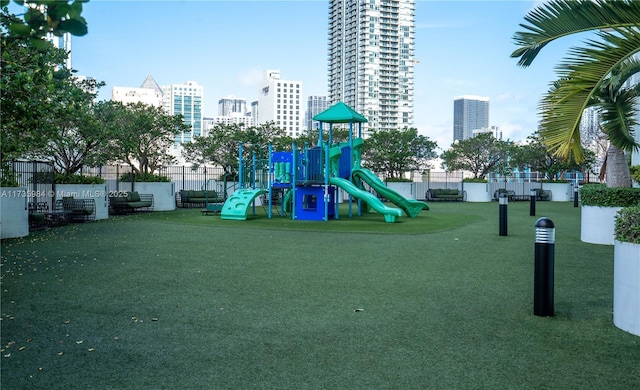 view of jungle gym with a yard