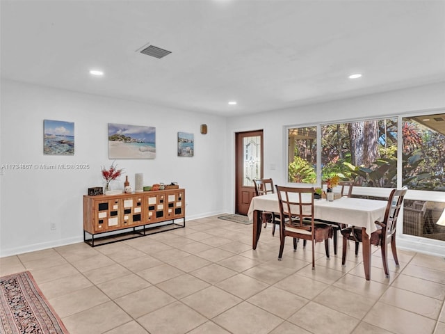 dining area featuring light tile patterned flooring, baseboards, visible vents, and recessed lighting