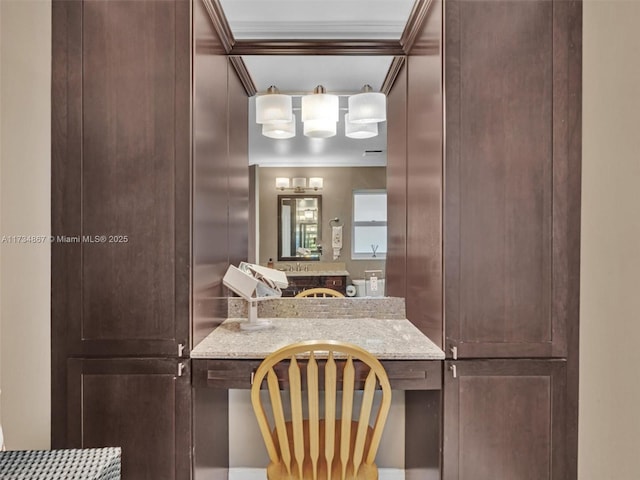 bathroom with crown molding