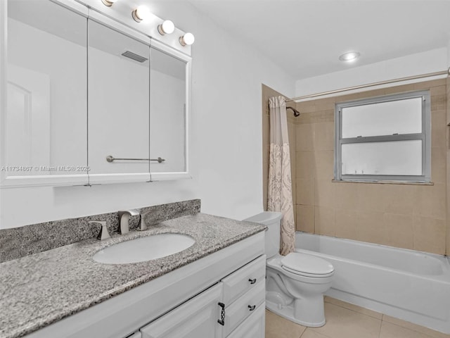 full bathroom with toilet, vanity, visible vents, tile patterned floors, and shower / bath combo