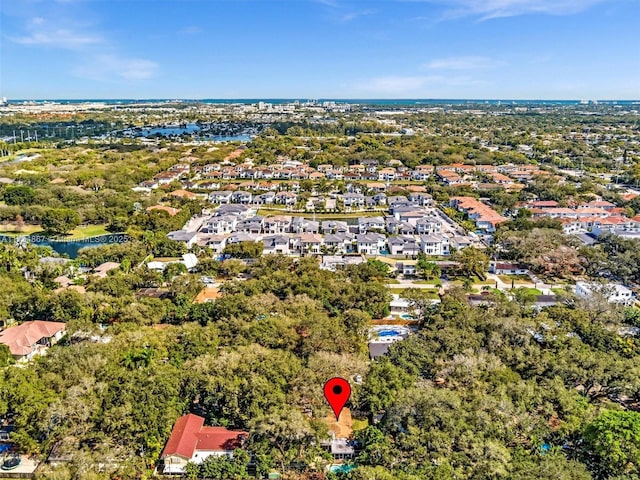 bird's eye view with a water view and a residential view