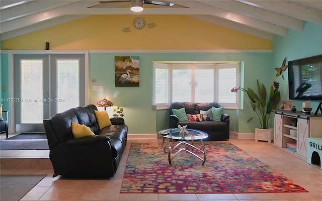 living room featuring lofted ceiling with beams, french doors, and light tile patterned flooring