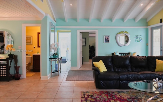 tiled living room with beamed ceiling