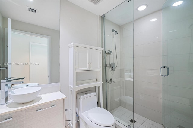 full bathroom with recessed lighting, visible vents, toilet, a shower stall, and vanity