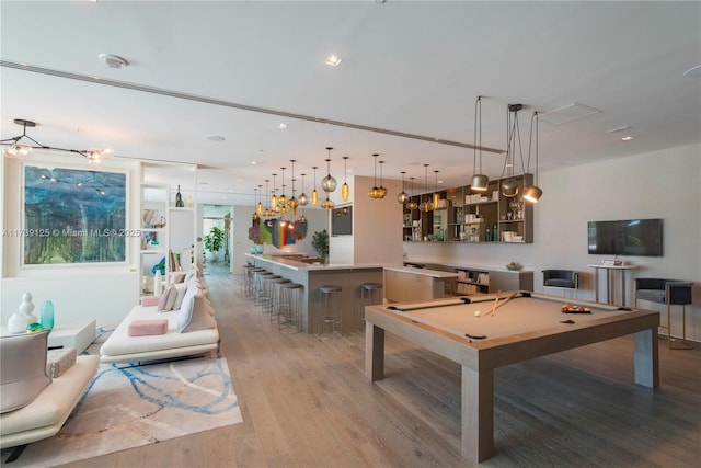 playroom with light wood finished floors, recessed lighting, and pool table