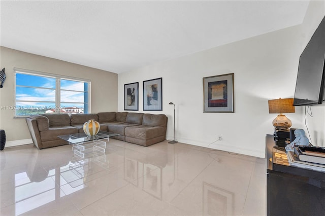 living room featuring light tile patterned floors