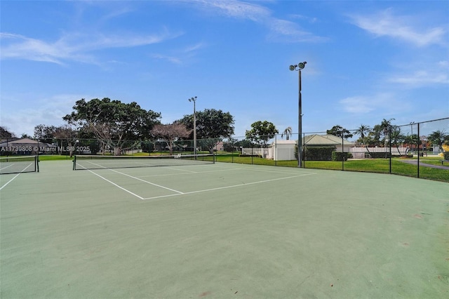 view of sport court featuring fence and community basketball court