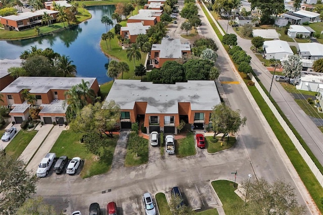 aerial view with a residential view and a water view