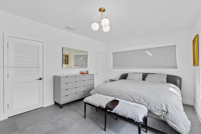bedroom with a chandelier