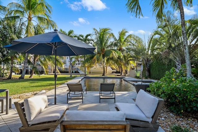 view of patio featuring a swimming pool