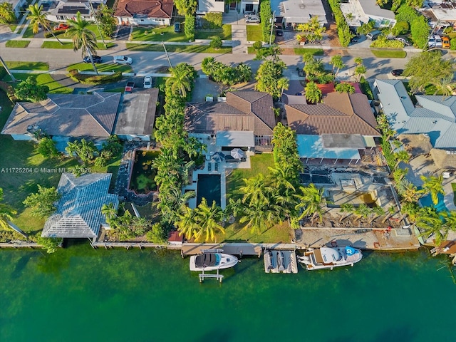 bird's eye view with a water view