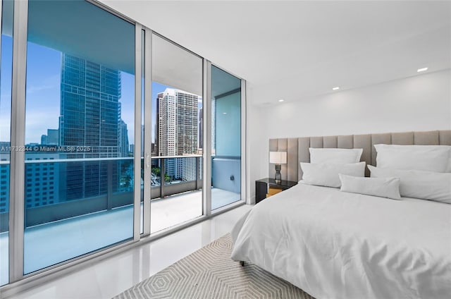 bedroom featuring expansive windows