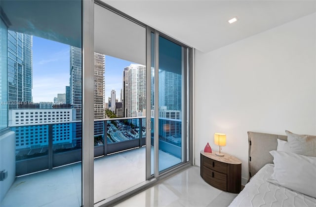 tiled bedroom with expansive windows