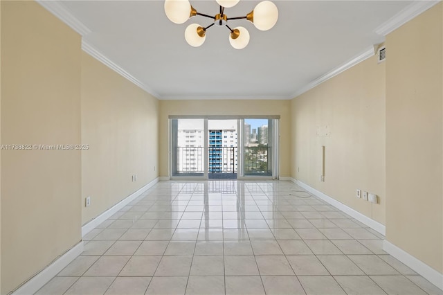 tiled empty room featuring a notable chandelier and crown molding