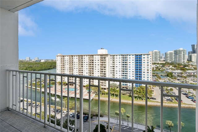 balcony featuring a water view