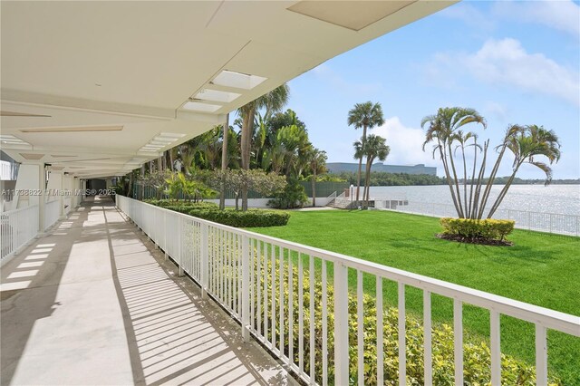 balcony featuring a water view