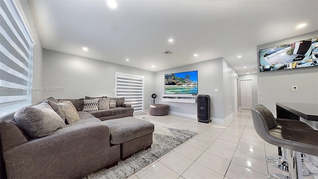 living room featuring light tile patterned floors