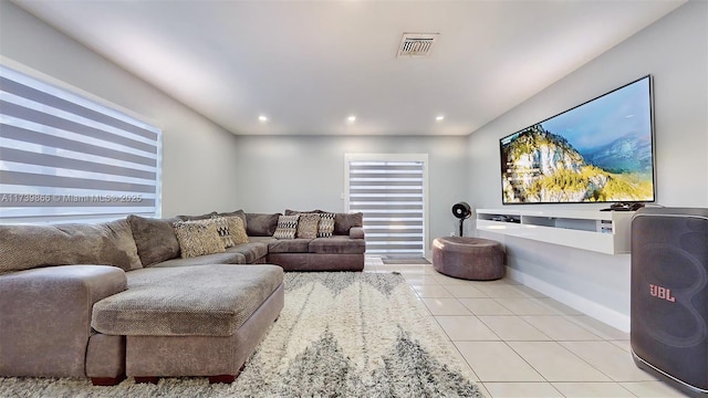 living room with light tile patterned flooring