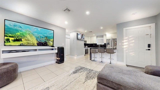 interior space featuring light tile patterned floors