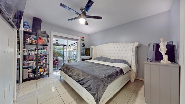 bedroom featuring light tile patterned flooring, access to outside, and ceiling fan