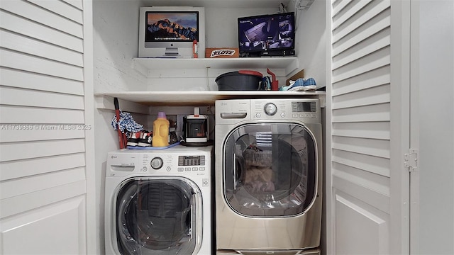 laundry area with washer and clothes dryer