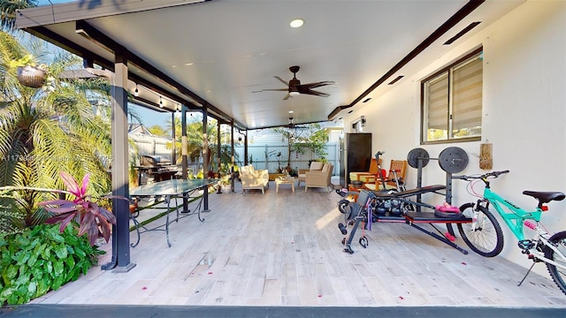 view of patio featuring ceiling fan