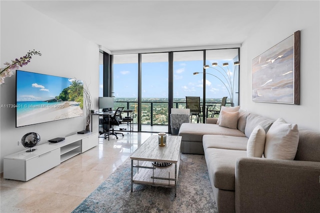 living room featuring floor to ceiling windows